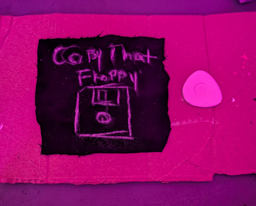 on the patch text that says Copy That Floppy with the drawing of a floppy disc