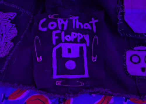 the patch now secured on my jacket with safety pins on each side